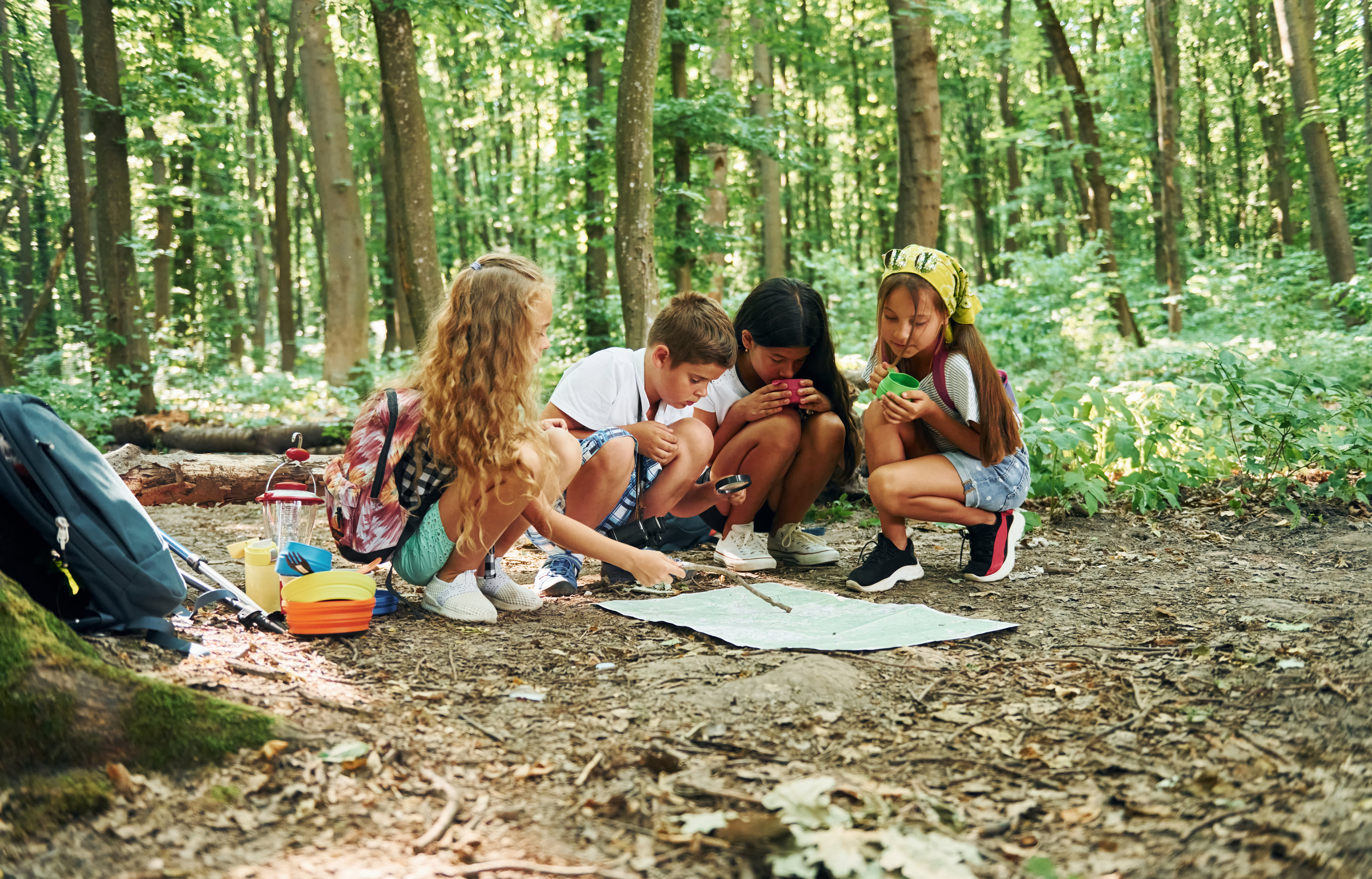 sitting-in-the-camp-kids-strolling-in-the-forest-2021-09-23-06-56-25-utc